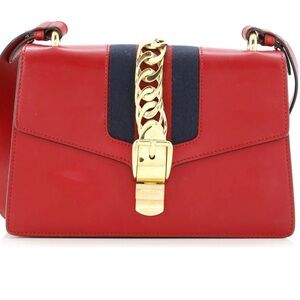 Gucci Sylvie in beautiful Red color with a tan Suede interior. COA included.